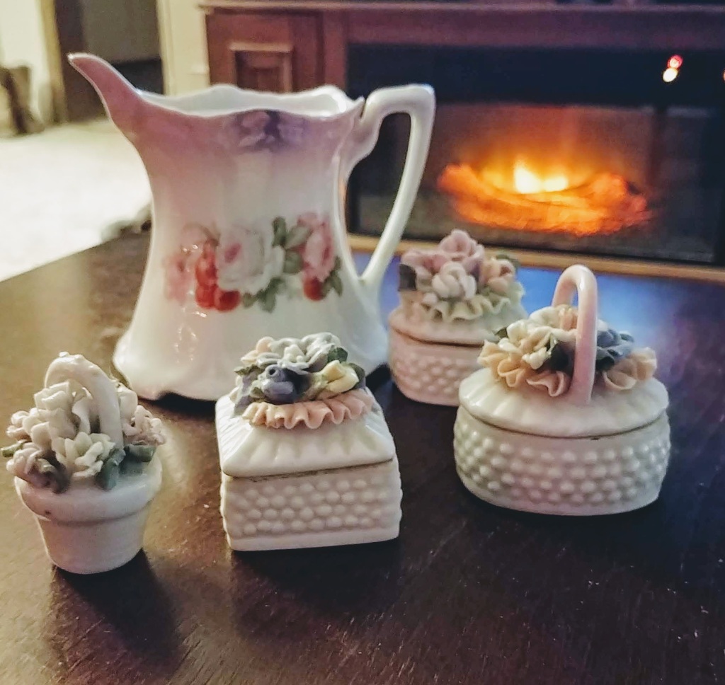 Vintage Orla Germany Porcelain on table in front of fire